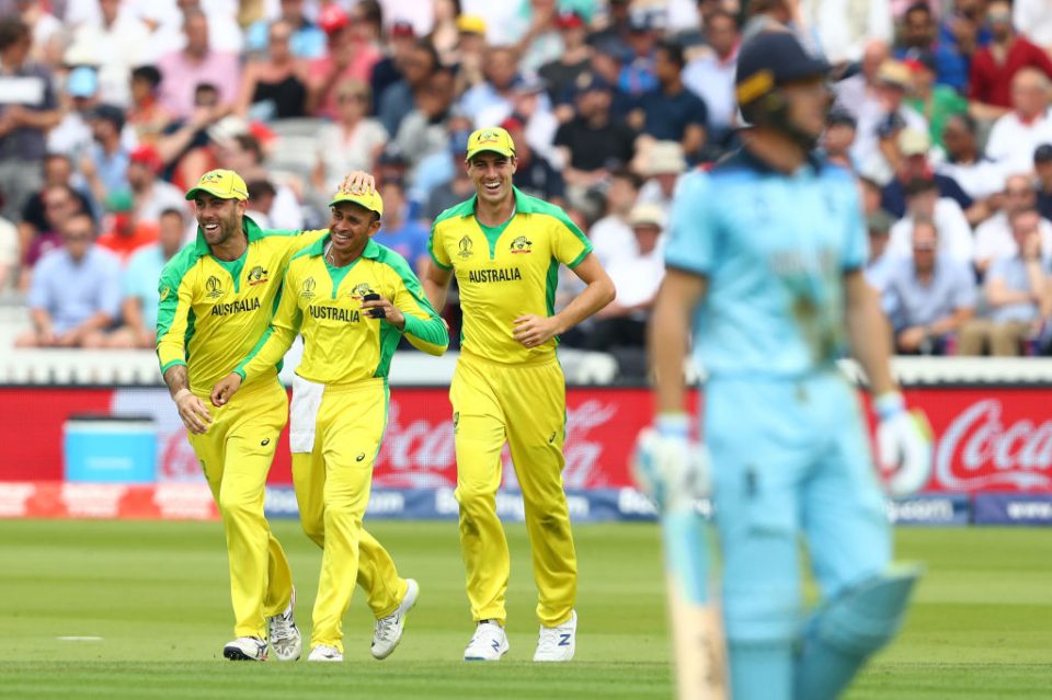LONDON, ENGLAND - JUNE 25: Usman Khawaja (2l) of Australia celebrates with Glenn Maxwell (l), and Pat Cummins (r) after taking a catch to dismiss Jos Buttler of England off the bowling of Marcus Stoinis during the Group Stage match of the ICC Cricket World Cup 2019 between England and Australia at Lords on June 25, 2019 in London, England. (Photo by Michael Steele/Getty Images)