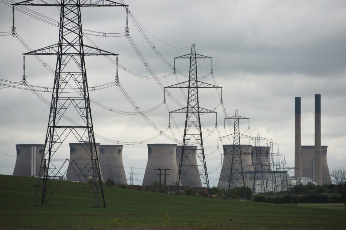 A general view shows pylons and Ferrybridge C power station, owned by energy company SSE, which is set to stop generating and close in March 2016, near Knottingley, northern England, on May 24, 2015. The coal-fired powerstation went online in 1966. AFP PHOTO / OLI SCARFF        (Photo credit should read OLI SCARFF/AFP/Getty Images)