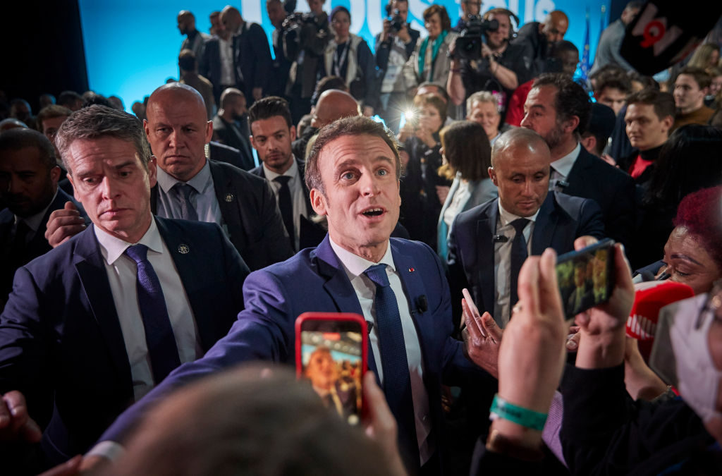 Macron wins second term as president, projections show CityAM