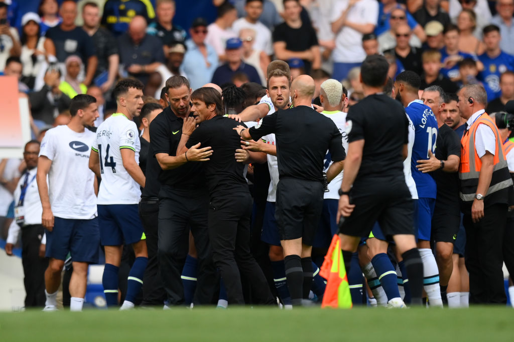 LONDON, ENGLAND - AUGUST 14: Antonio Conte, Manager of Tottenham Hotspur is held back prior to being shown a red card after the Premier League match between Chelsea FC and Tottenham Hotspur at Stamford Bridge on August 14, 2022 in London, England. (Photo by Shaun Botterill/Getty Images)