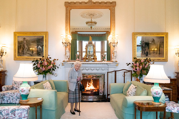 Queen Elizabeth II waits in the Drawing Room before receiving newly elected leader of the Conservative party Liz Truss at Balmoral Castle on Tuesday