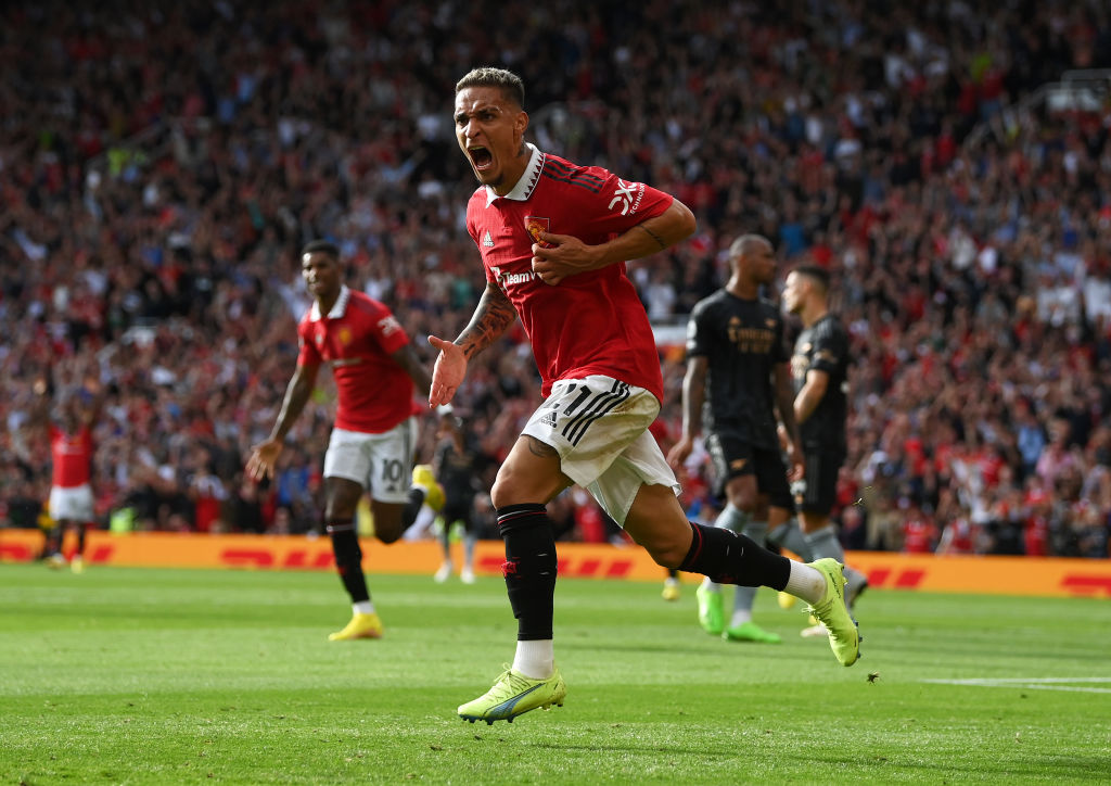 MANCHESTER, ENGLAND - SEPTEMBER 04:  Antony of Manchester United celebrates after scoring during the Premier League match between Manchester United and Arsenal FC at Old Trafford on September 04, 2022 in Manchester, England. (Photo by Shaun Botterill/Getty Images)