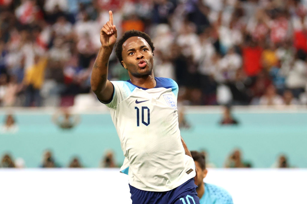 DOHA, QATAR - NOVEMBER 21: Raheem Sterling of England celebrates after scoring their team's third goal during the FIFA World Cup Qatar 2022 Group B match between England and IR Iran at Khalifa International Stadium on November 21, 2022 in Doha, Qatar. (Photo by Julian Finney/Getty Images)