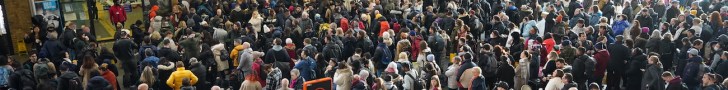 Passengers wait at the barriers at King's Cross station in London following a strike by members of the Rail, Maritime and Transport union (RMT), in a long-running dispute over jobs and pensions. Picture date: Tuesday December 27, 2022.