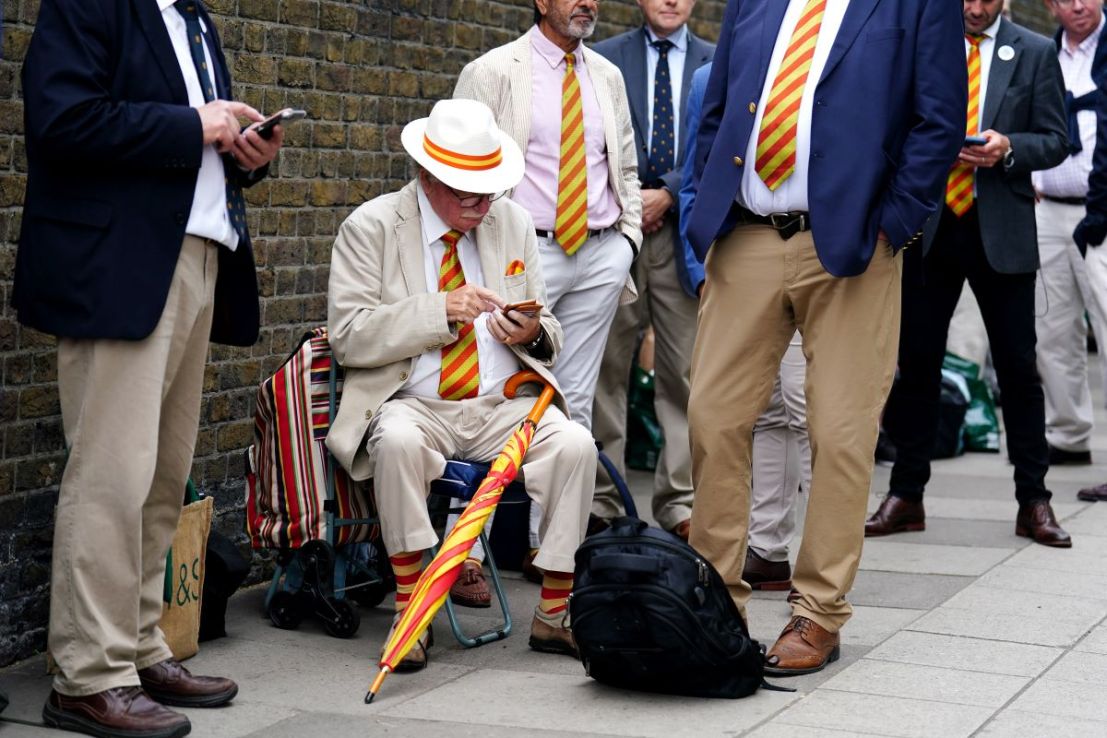 MCC members queue ahead of during day one of the second Ashes test match at Lord's, London.  Photo credit : Mike Egerton/PA Wire. 