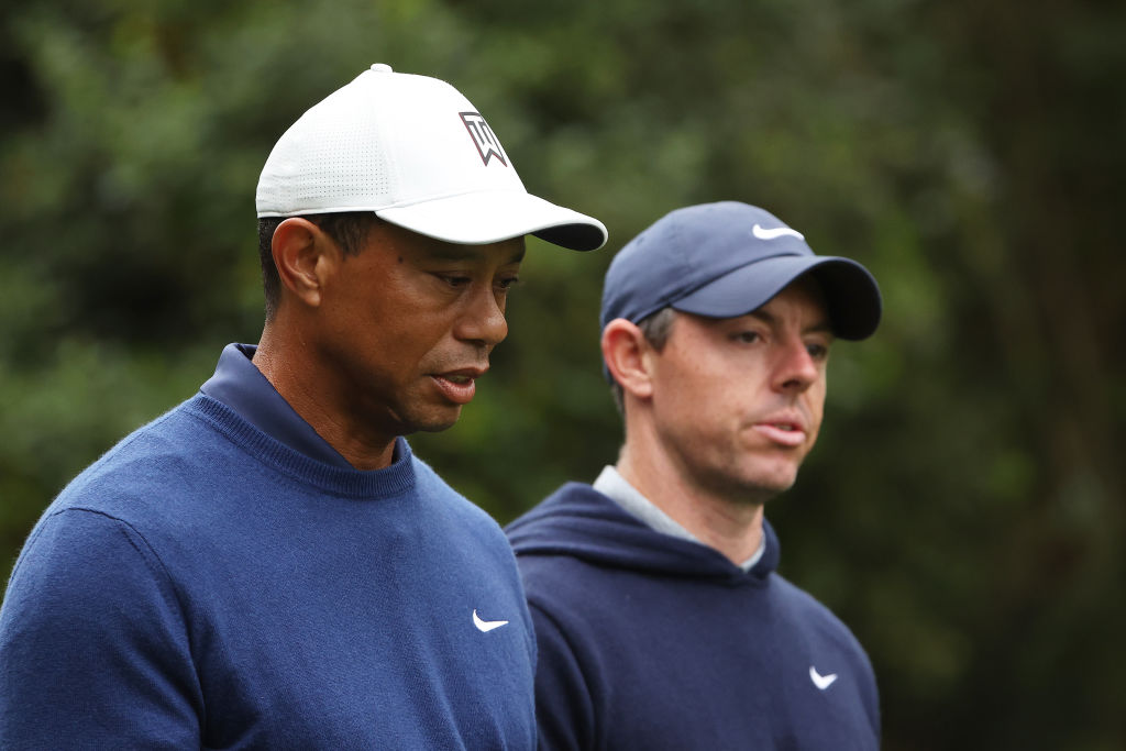 AUGUSTA, GEORGIA - APRIL 03: Tiger Woods of the United States and Rory McIlroy of Northern Ireland walk to the 11th fairway during a practice round prior to the 2023 Masters Tournament at Augusta National Golf Club on April 03, 2023 in Augusta, Georgia. (Photo by Christian Petersen/Getty Images)