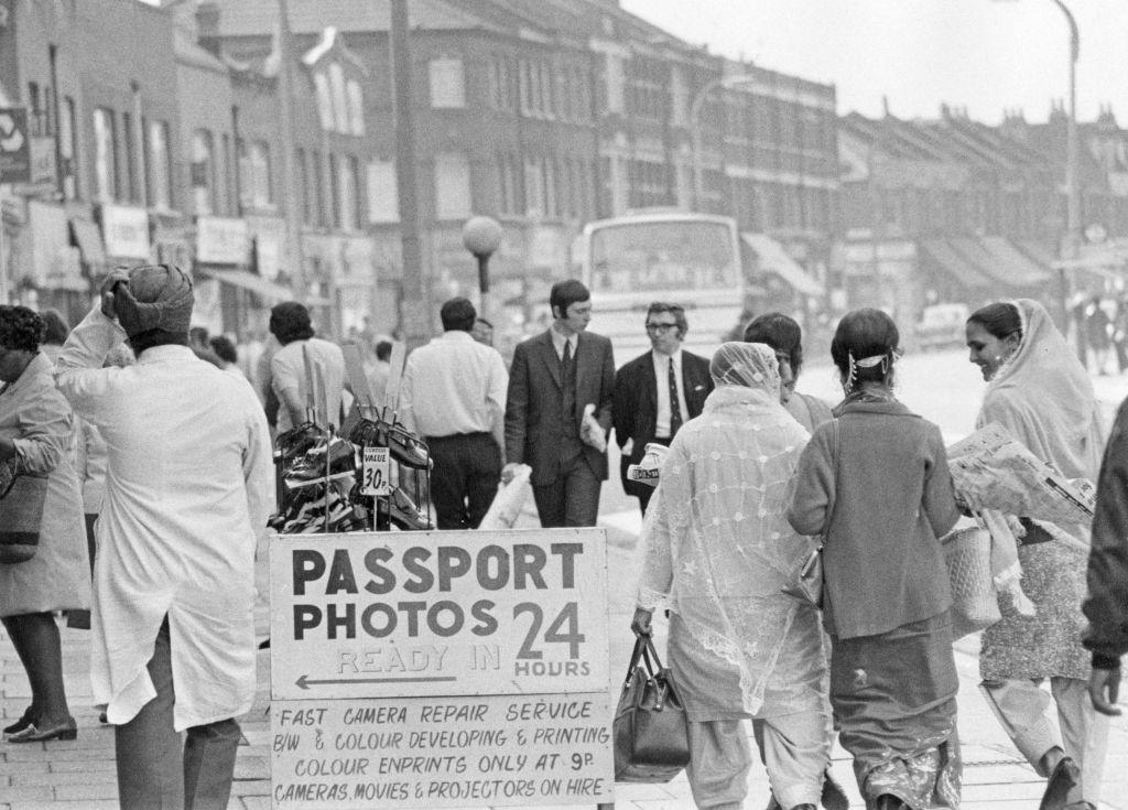 Indian immigrants in Southall in 1972 - with enterprising local businesses servicing their need for new documentation