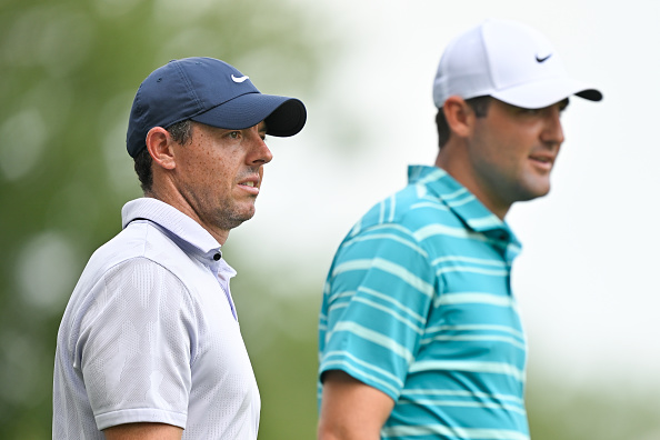 MEMPHIS, TENNESSEE - AUGUST 11: Rory McIlroy of Northern Ireland and Scottie Scheffler walk off the 11th tee box together during the second round of the FedEx St. Jude Championship at TPC Southwind on August 11, 2023 in Memphis, Tennessee. (Photo by Ben Jared/PGA TOUR via Getty Images)