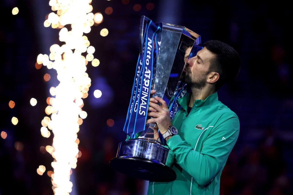 PALA ALPITOUR, TORINO, ITALY - 2023/11/19: Novak Djokovic of Serbia celebrates with the trophy at the end of the final singles match between Novak Djokovic of Serbia and Jannik Sinner of Italy on Day eight of the Nitto ATP World Tour Finals. Novak Djokovic wins 6-3, 6-3 over Jannik Sinner. (Photo by Marco Canoniero/LightRocket via Getty Images)