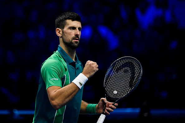 TURIN, ITALY - NOVEMBER 19: Novak Djokovic of Serbia celebrates a score against Jannik Sinner of Italy  in their Final Men's Single's Nitto ATP match  during day eight of the Nitto ATP Finals at Pala Alpitour on November 19, 2023 in Turin, Italy. (Photo by Stefano Guidi/Getty Images)