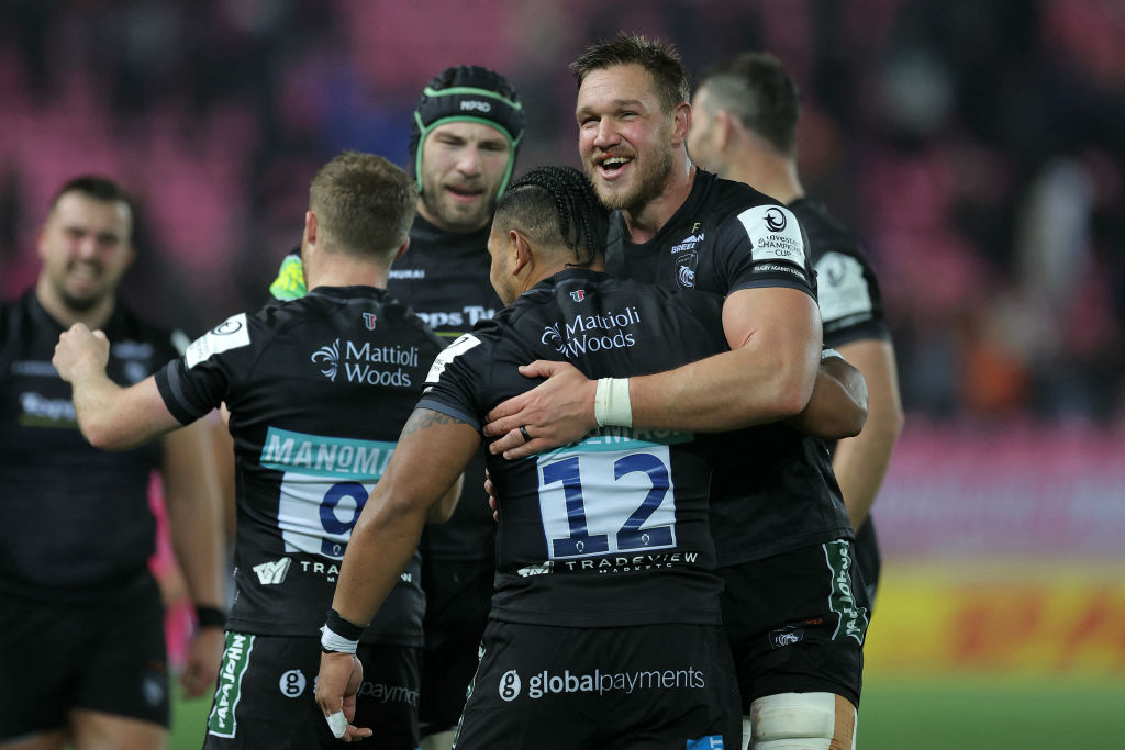 Leicester Tigers' players celebrate at the end of the European Champions Cup first round Day 2 Pool 4 Rugby Union match between Stade Francais (FRA) and Leicester (ENG) at Jean-Bouin stadium in Paris on December 17, 2023. Leicester Tigers won 27-24 against Stade Francais. (Photo by Thomas SAMSON / AFP) (Photo by THOMAS SAMSON/AFP via Getty Images)