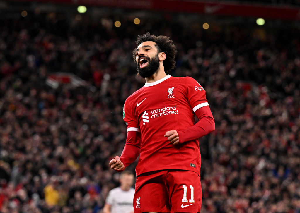 LIVERPOOL, ENGLAND - DECEMBER 20: (THE SUN OUT, THE SUN ON SUNDAY OUT) Mohamed Salah of Liverpool celebrates after scoring the fourth goal during the Carabao Cup Quarter Final match between Liverpool and West Ham United at Anfield on December 20, 2023 in Liverpool, England. (Photo by Andrew Powell/Liverpool FC via Getty Images)