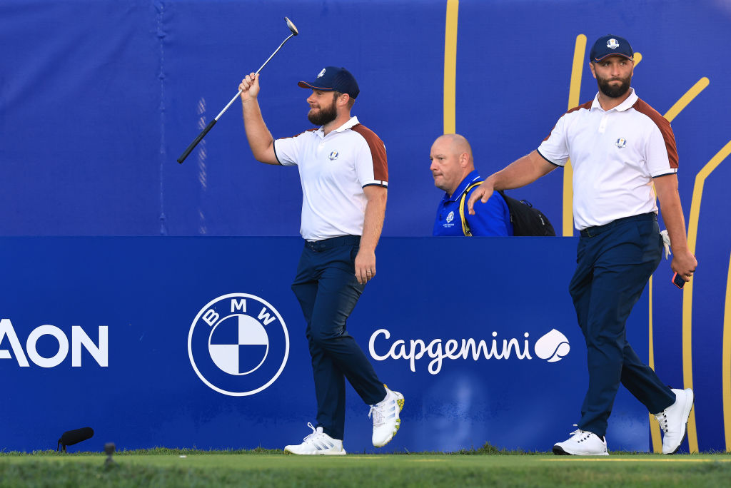 ROME, ITALY - SEPTEMBER 30: Jon Rahm of Spain and The European Team on the first tee with Tyrrell Hatton in their match against Patrick Cantlay and Xander Schauffele by 2&1 during the Saturday morning foursomes matches of the 2023 Ryder Cup at Marco Simone Golf Club on September 30, 2023 in Rome, Italy. (Photo by David Cannon/Getty Images)