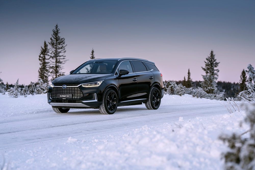 The pure-electric all-wheel-drive BYD Tang SUV driving in Norway.