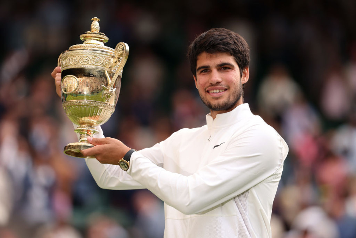 Wet Wimbledon fails to dampen profits at All England Club as sales hit new record