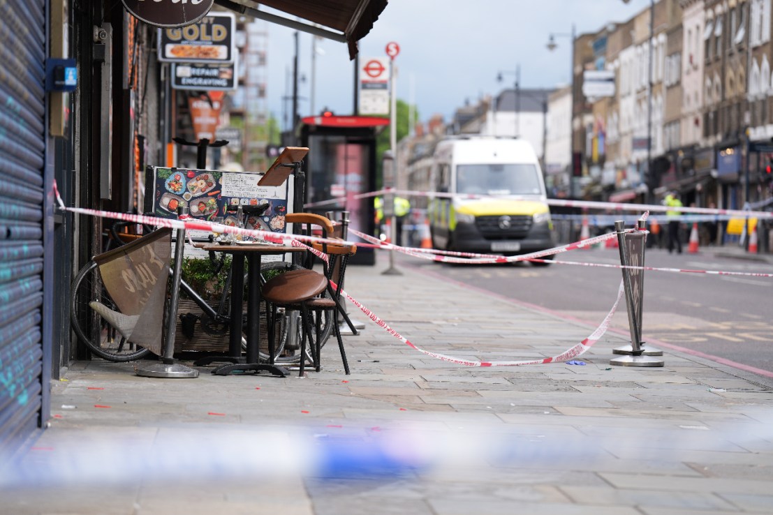 Police at the scene of a shooting at Kingsland High Street, Hackney, east London, where three adults and a child have been injured. The Metropolitan Police have said the child is in a serious condition and that they are awaiting updates on the condition of the adults. Police said they were called to the scene at around 9.20pm on Wednesday with specialist firearms officers attending.