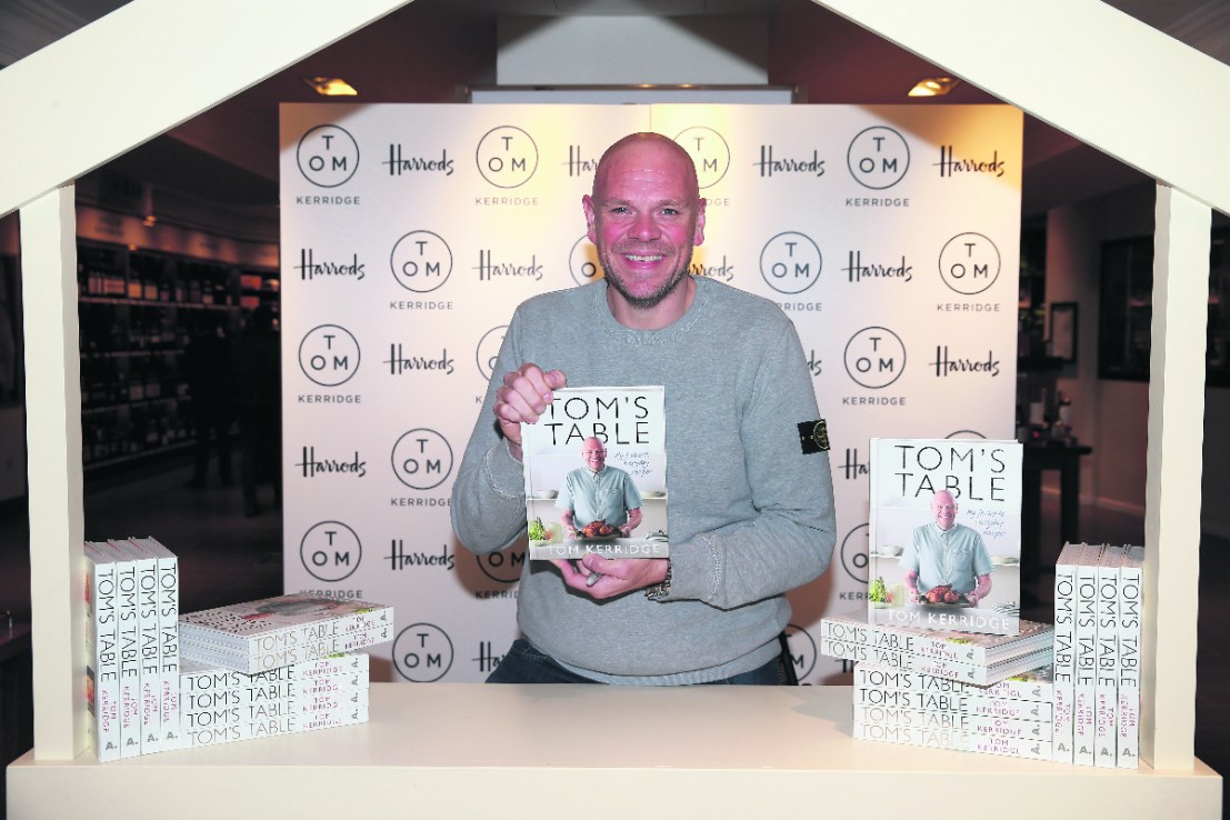 LONDON, ENGLAND - SEPTEMBER 23:  Chef  Tom Kerridge poses with a copy of his book 