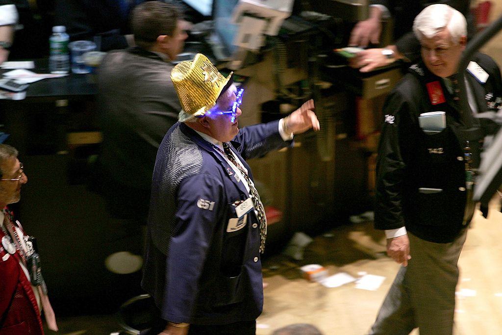 NEW YORK - DECEMBER 29:  Traders work the floor of the New York Stock Exchange (NYSE) on the last day of trading for the year December 29, 2006 in New York City.  The year of 2006 was another high growth year for Wall Street, with the Dow reportedly up 16.7 percent  as of last Thursday's record.  (Photo by Spencer Platt/Getty Images)