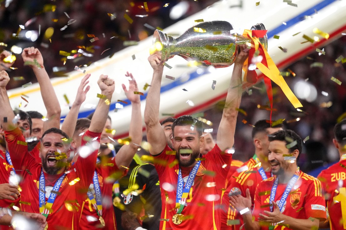 Spain players celebrate with the trophy after winning the UEFA Euro 2024 Final match at the Olympiastadion, Berlin. Photo credit: Adam Davy/PA Wire.
 