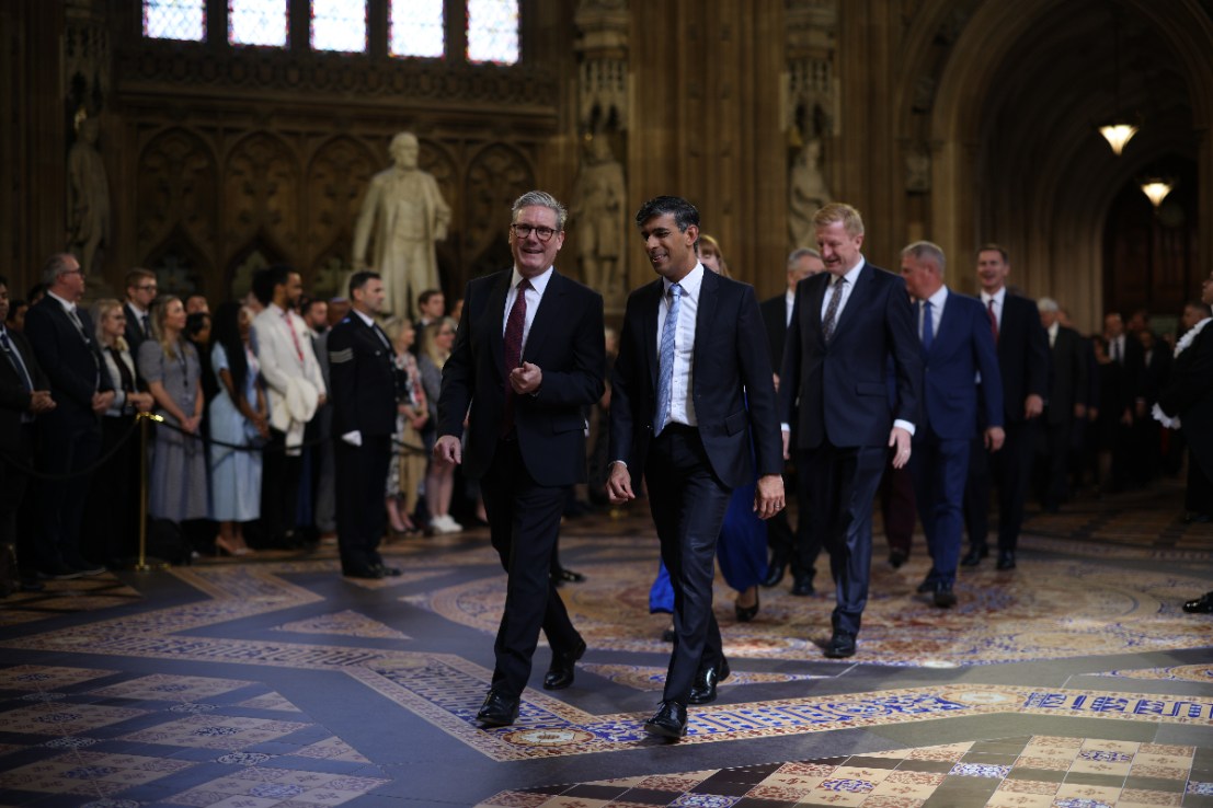 Prime Minister Sir Keir Starmer (left) and former prime Minister Rishi Sunak (right) lead MPs to the House of Lords to hear the King's Speech. Photo: PA