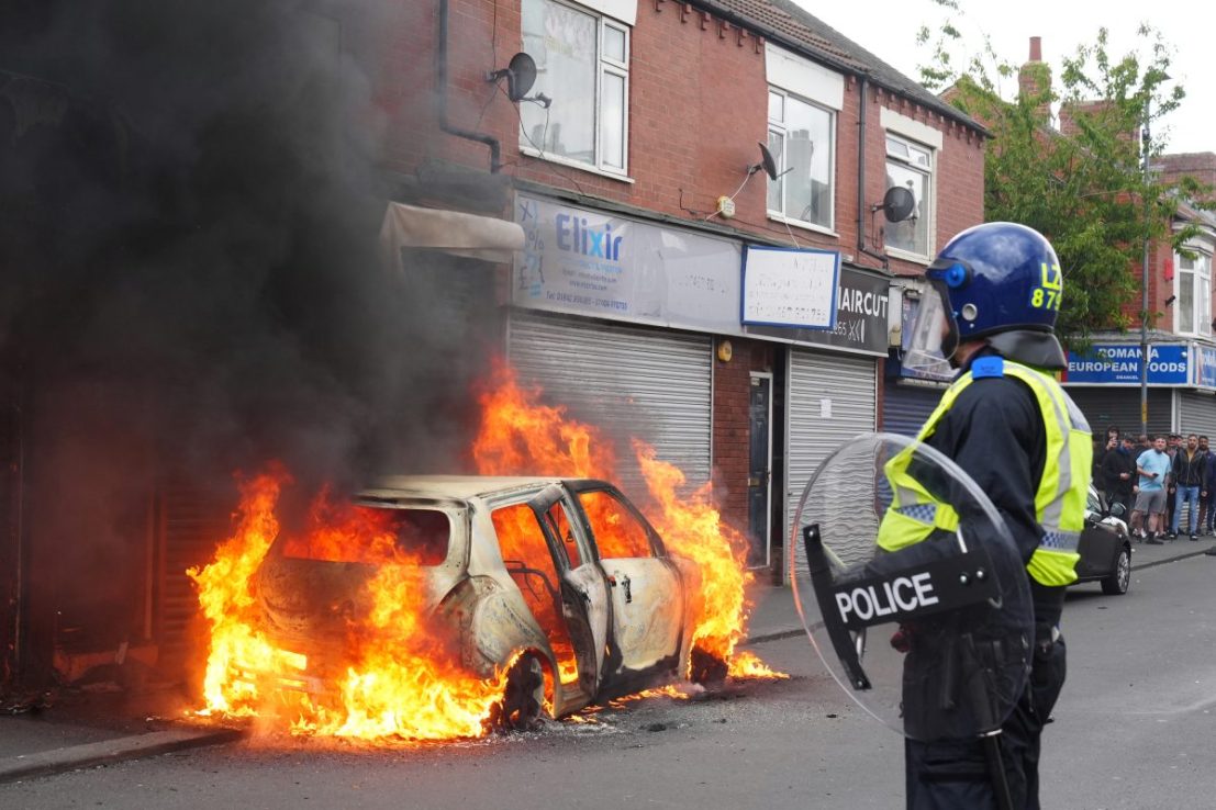 A car burns on Parliament Road, in Middlesbrough, during an anti-immigration protest. Picture date: Sunday August 4, 2024. PA Photo. See PA story POLICE Southport . Photo credit should read: Owen Humphreys/PA Wire