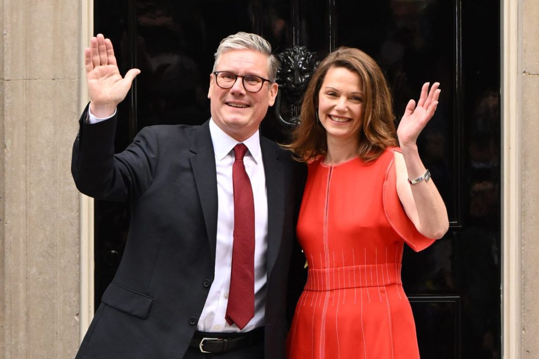 LONDON, ENGLAND - JULY 5:  Labour leader and incoming Prime Minister Sir Keir Starmer and wife Victoria greet supporters as they enter 10 Downing Street following Labour's landslide election victory  on July 5, 2024 in London, England. The Labour Party won a landslide victory in the 2024 general election, ending 14 years of Conservative government. (Photo by Leon Neal/Getty Images)