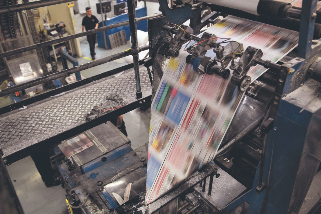  The press gets up to speed at the beginning of a print run   (Photo by Leon Neal/Getty Images)