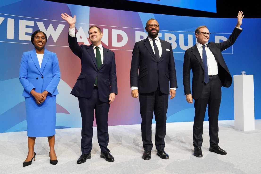 (left to right) Tory leadership candidates, Kemi Badenoch, Robert Jenrick , James Cleverly and Tom Tugendhat, stand together on stage after delivering their speeches during the Conservative Party Conference at the International Convention Centre in Birmingham.  Stefan Rousseau/PA Wire
