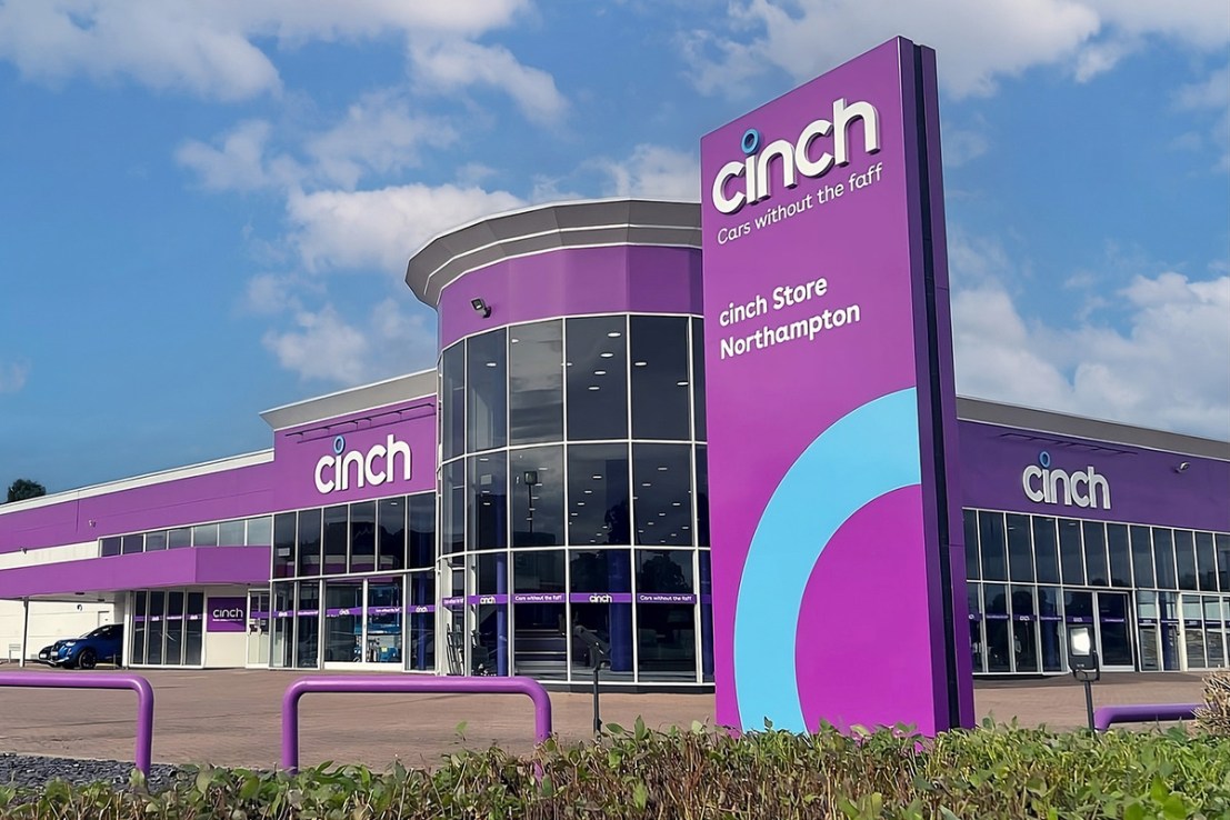 The owner of Cinch and Webuyanycar has slashed its pre-tax loss.