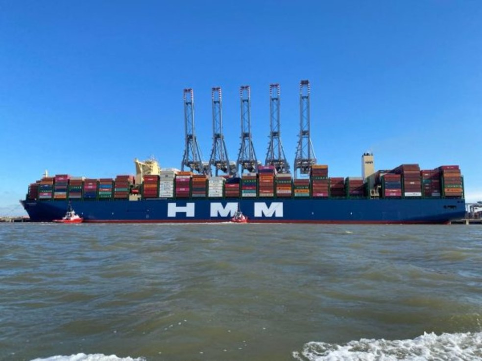 A giant container ship pulls into London Gateway.