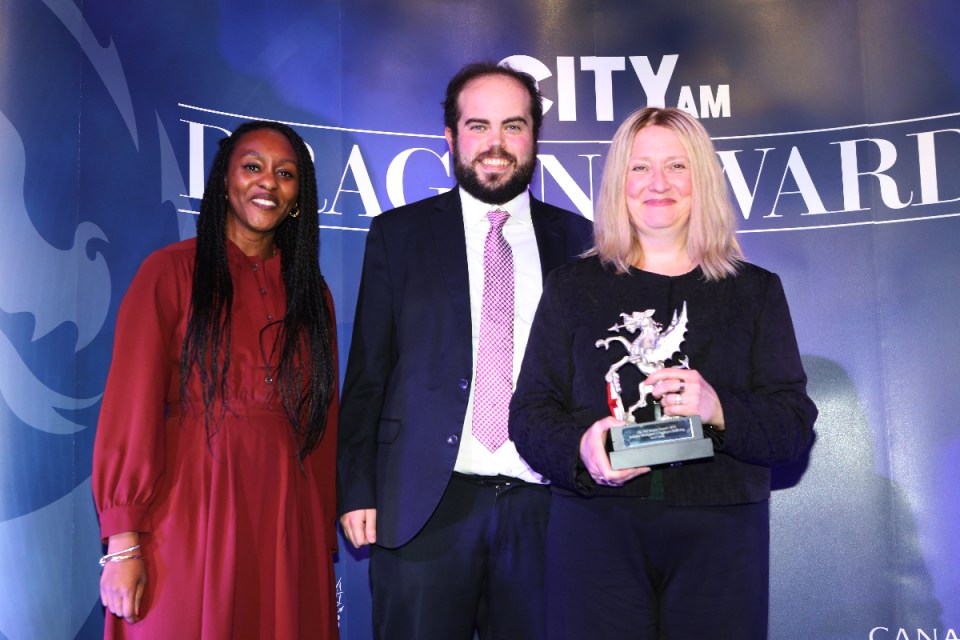 Carolyn Pepper (right) partner at Reed Smith presented with the award by the Canary Wharf Group's Associate Director of Sustainability Olivia Phillips (left). City AM Dragon Awards 2024 at Mansion House. (Credit: Gretel Ensignia) 