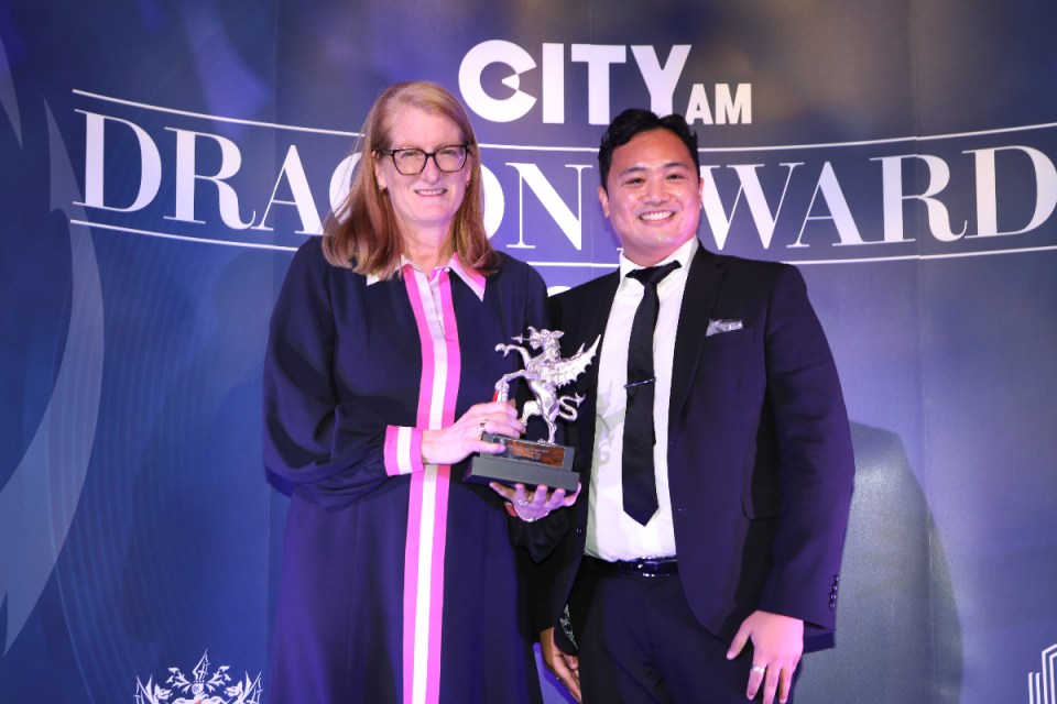 Kate Grussing CBE of Sapphire Partners, Advisor of the Year, pictured with THG's chief sustainability officer, Mark Jones.  City A.M. Dragon Awards 2024 at Mansion House. (Credit: Gretel Ensignia)