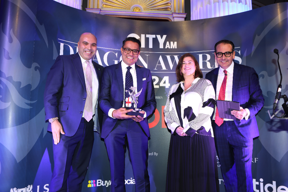 Holding the award, Rakesh Harji COO of Zilch with Ryan Mendy, Chief Communications Officer, alongside LSEG's Head of Sustainability Jane Goodland and Oli Barrett. City AM Dragon Awards 2024 at Mansion House. (Credit: Gretel Ensignia) 