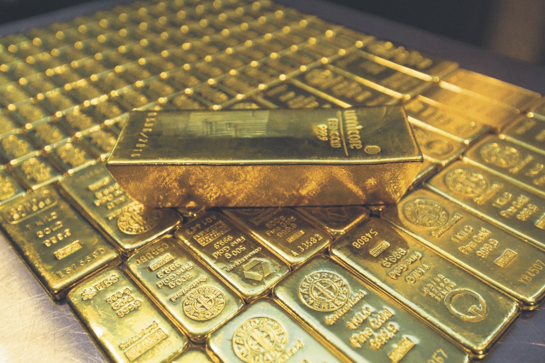 Gold prices hit a new all time high this month. (Photo by Ulrich Baumgarten via Getty Images)