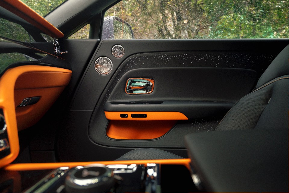 Rolls-Royce spectre in tango orange