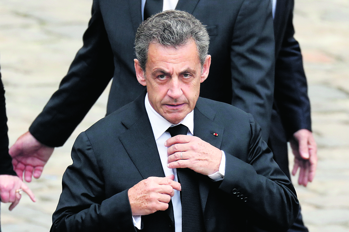 Sarkozy: Former French president on trial over alleged Gaddafi financing